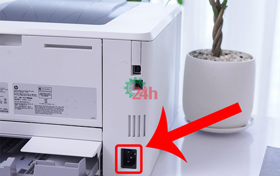 thực hiện khởi động lại máy in